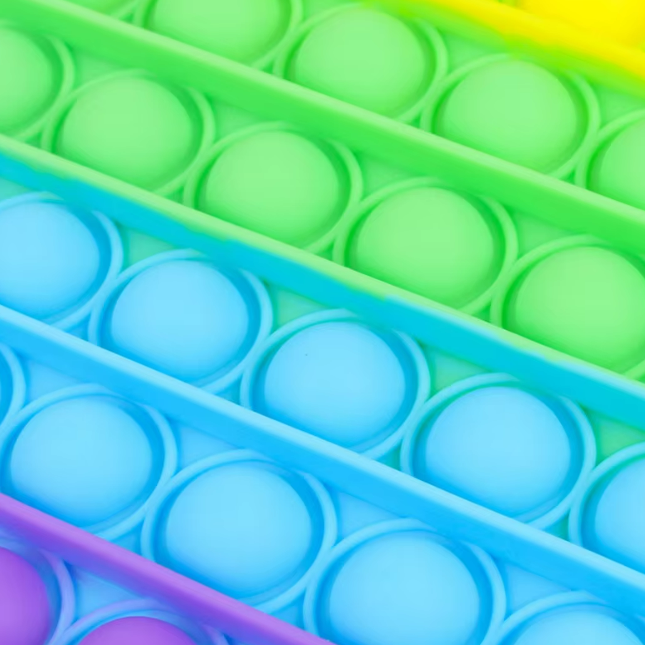 Rainbow Dino Fidget | Päästä stressi irti - Stressinlievittäjä lapsille