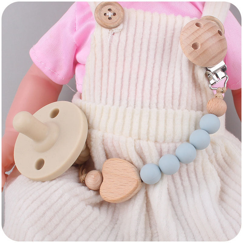 Ecotoys CozyClip™ | Sicher & stilvoll - Holz-Schnullerkette für Babys