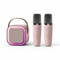Thumbnail for MelodyMates karaoke set: roze draagbare speaker met twee draadloze microfoons en LED-verlichting