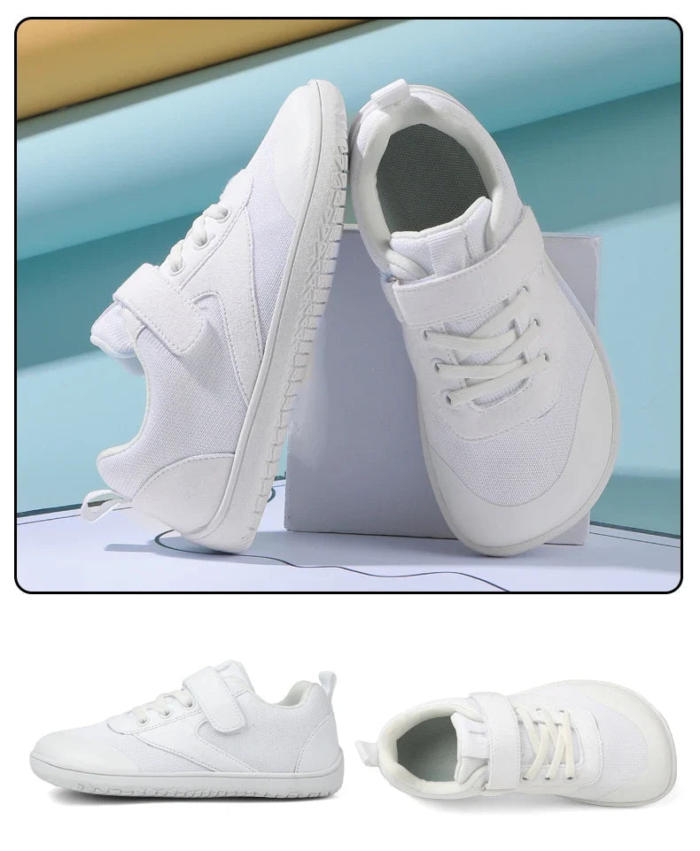 Kindersneaker in wit, zwart en roze — barefootschoenen met brede pasvorm en flexibele zool